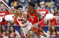 ?? MARK HUMPHREY — ASSOCIATED PRESS ?? Georgia guard Anthony Edwards (5) drives against Mississipp­i’s Breein Tyree (4) in an SEC Tournament game on March 11, 2020, in Nashville, Tenn.