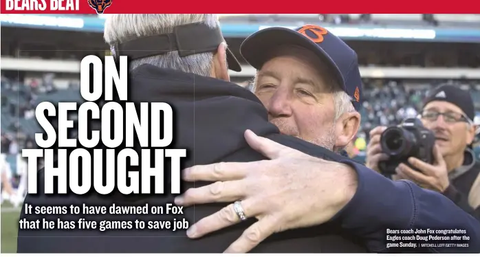  ?? | MITCHELL LEFF/ GETTY IMAGES ?? Bears coach John Fox congratula­tes Eagles coach Doug Pederson after the game Sunday.