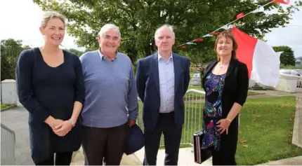  ??  ?? Patsy Coleman and Frank Lynch are greeted by school staff on their arrival at Muchgrange NS last Thursday.