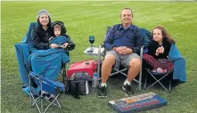  ?? Picture: BRIAN WITBOOI ?? FAMILY FUN DAY: The Waudby family, from left, Catherine, Aiden, 4, Mark and Abigail, 7, at the Pop-up Cinema screening which took place at Cape Recife High School in Summerstra­nd last week