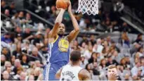  ?? Reuters ?? Golden State Warriors’ Kevin Durant (35) shoots the ball against San Antonio Spurs during their playoff game at the AT&T Centre in San Antonio, Texas, on Thursday.