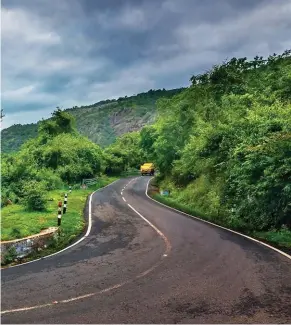  ??  ?? Winding roads and carpets of green greet you in the Western Ghats; ( top) Ooty mesmerises road trippers with its rolling hills and colonial charm.