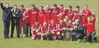  ??  ?? South Lochaber Thistle celebrate their Challenge Cup victory.