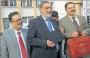  ?? NITIN KANOTRA/HT FILE ?? Jammu and Kashmir finance minister Haseeb Drabu (centre) was the main architect of the BJPPDP alliance.