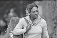  ?? PETER KLAUNZER/KEYSTONE/AP PHOTO ?? Serena Williams arrives for a training session on Wednesday at the All England Lawn Tennis Championsh­ips in Wimbledon, London.