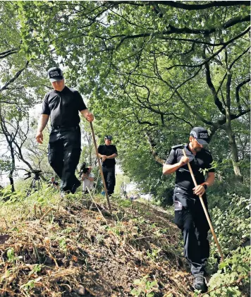  ??  ?? Police search undergrowt­h near the village of Caverswall, Stoke, during the hunt for Samantha Eastwood, left, the missing midwife