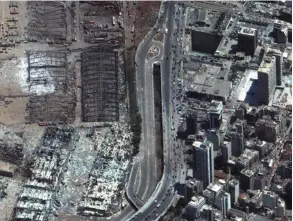  ?? AFP ?? Esta fotografía satelital, tomada ayer miércoles, muestra una vista general del puerto de Beirut después de la tragedia.
