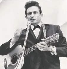  ??  ?? Country singer Johnny Cash performed at the Canadian National Exhibition in Toronto in 1965.