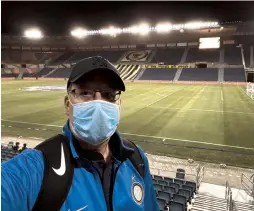  ?? (Joshua Halickman/Courtesy) ?? THE AUTHOR takes a selfie at an empty Teddy Stadium on Saturday in the first game since the Israeli soccer league returned from a long hiatus.