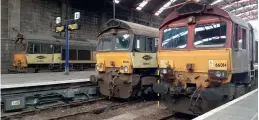  ??  ?? The unusual sight of three Class 66s in Penzance station on December 6, 2020 during the west Cornwall engineerin­g project. From left to right are Colas 66850 with 6C20, Colas 66846 with 6C21 and DB Cargo 66014 with 6W23. Outside at Platform 4, Colas 66849 was the last to arrive with 6C24, all starting from Westbury and all in conjunctio­n with relaying work at St Erth and Carn Brea between December 6 and 10, 2020. (Andrew Triggs)