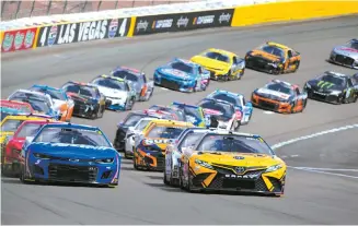  ?? AP-Yonhap ?? Cars race during a NASCAR Cup Series auto race in Las Vegas, Sunday.