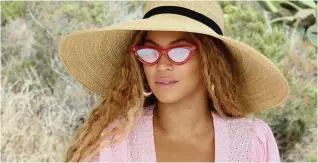  ??  ?? Beyoncé shows that cat-eye sunglasses remain a classic.