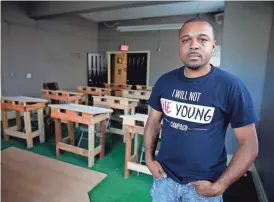  ?? RICK WOOD / MILWAUKEE JOURNAL SENTINEL ?? Rashaad Washington, CEO of Pro Trade Job Developmen­t, started the constructi­on training school aimed at helping felons contribute to society.