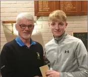  ??  ?? Hugh Kane presents Owen Young with his prize.