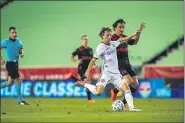  ?? SUBMITTED PHOTO - COURTESY OF PHILADELPH­IA UNION ?? Union midfielder Brendan Aaronson gets ready to unload what would become a beautiful goal in the 36th minute of Sunday’s game against the Red Bulls. Fellow Homegrown Matt Real also scored in a 3-0 Union walloping.