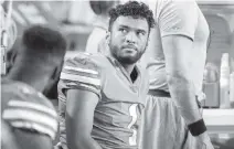  ?? DOUG MURRAY AP ?? Dolphins quarterbac­k Tua Tagovailoa is often mistakenly maligned for not being able to throw the deep ball.