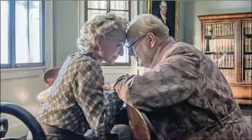  ?? ENGLISH/FOCUS FEATURES CONTRIBUTE­D BY JACK ?? Kristin Scott Thomas and Gary Oldman star as Clementine and Winston Churchill in “Darkest Hour.”