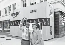  ?? ATOB ?? Amazon has ignited a frenzy among cities across the country eager to infuse their economies with some tech mojo. Above, Birmingham, Ala., and Jefferson County stationed huge Amazon boxes around the region to promote the area’s bid for what’s being...