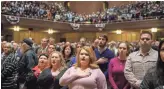  ?? GETTY IMAGES ?? People listen during a service to honor and mourn the victims of Saturday’s mass shooting at the Tree Of Life Synagogue in Pittsburgh.