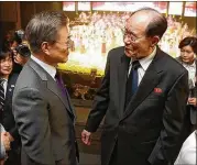  ?? SOUTH KOREAN PRESIDENTI­AL BLUE HOUSE ?? South Korean President Moon Jae-in (left) talks with North Korea’s nominal head of state, Kim Yong-Nam, during a performanc­e of North Korea’s Samjiyon Orchestra on Sunday at the National Theater in Seoul, South Korea.