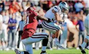  ?? [PHOTO BY BRYAN TERRY, THE OKLAHOMAN] ?? Oklahoma’s Jalen Redmond makes a tackle for a loss in Saturday’s 51-14 win over Kansas State. Redmond’s role expanded after making his season debut a week earlier against TCU.