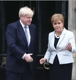  ??  ?? Nicola Sturgeon and Mr Johnson continue to clash over Scottish independen­ce