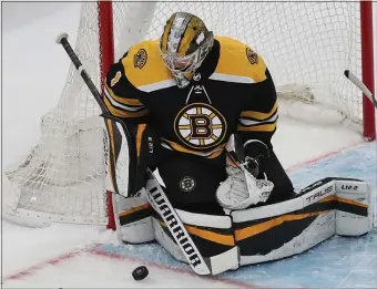  ?? NANCY LANE / HERALD STAFF FILE ?? SHOW OF FAITH: Jeremy Swayman makes a save during Game 4 of their Eastern Conference first-round playoff series against Carolina at TD Garden on Sunday.