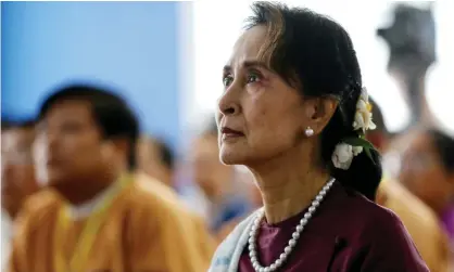  ?? Photograph: AFP/Getty Images ?? Aung San Suu Kyi, Myanmar’s ousted state counsellor, has been convicted of importing walkie-talkies and breaking Covid rules.