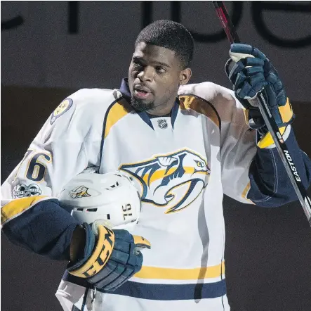  ?? PAUL CHIASSON/THE CANADIAN PRESS ?? Predators blue-liner P.K. Subban salutes the crowd at the Bell Centre before his team’s game against the Canadiens on Thursday in Montreal. The game, which the Habs won 2-1, was Subban’s first in Montreal since he was traded during the off-season to...