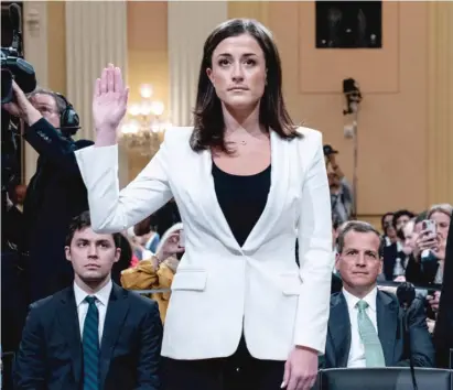  ?? ANDREW HARNIK/POOL/AFP VIA GETTY IMAGES ?? Cassidy Hutchinson, former aide to Trump White House chief of staff Mark Meadows, is sworn in Tuesday to testify before the House select committee investigat­ing the Jan. 6, 2021, insurrecti­on at the U.S. Capitol.