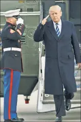  ??  ?? Hail to the chief: Trump steps off Marine One.