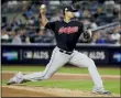  ?? FRANK FRANKLIN II — THE ASSOCIATED PRESS ?? Cleveland Indians pitcher Carlos Carrasco (59) delivers against the New York Yankees during the first inning in Game 3of baseball’s American League Division Series, Sunday in New York.