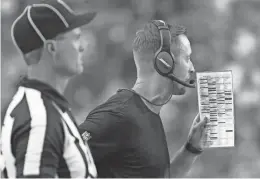  ?? MICHAEL CHOW/THE REPUBLIC ?? Cardinals coach Kliff Kingsbury calls a play against the Houston Texans during the second quarter in Sunay in Glendale.