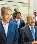  ?? RICARDO ROJAS/REUTERS ?? Zapatero y el dominicano Medina.