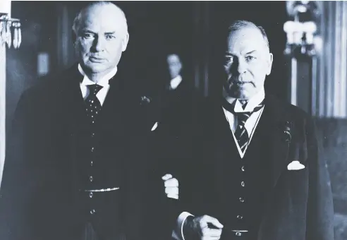  ?? NATIONAL ARCHIVES OF CANADA/NELSON QUARRINGTO­N ?? Not much is known about the personal life of Richard Bedford Bennett, left, but the same can't be said of William Lyon Mackenzie King. They are shown linking arms.