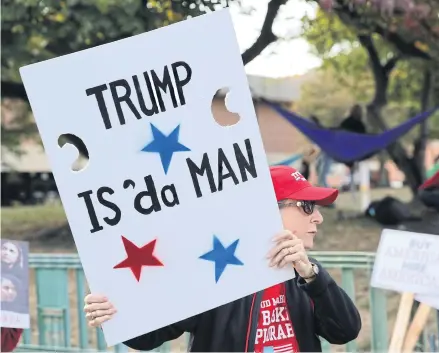  ?? REUTERS/SHANNON STAPLETON ?? A supporter of US President Donald Trump protests outside the fourth US Democratic presidenti­al candidates’ 2020 election debate at Otterbein University in Westervill­e, Ohio, on Tuesday.