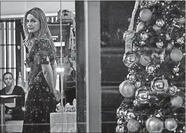  ?? [CRAIG RUTTLE/THE ASSOCIATED PRESS] ?? A forlorn-looking Savannah Guthrie looks out the window while on the set of the “Today” show Wednesday, a day when she had to announce the firing of her co-host, Matt Lauer.