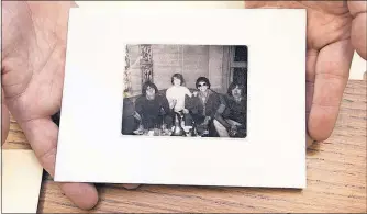  ?? [PHILIP GREENBERG/THE NEW YORK TIMES] ?? Among the items in the collection is a handmade card with a photo of the members of the Velvet Undergroun­d.