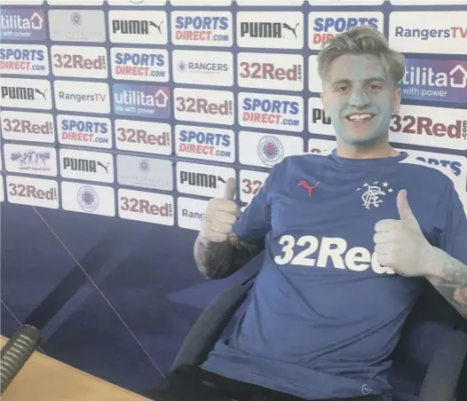  ??  ?? Jason Cummings, wearing face paint at yesterday’s media briefing to promote a ‘Blue All Over’ 5km charity fun run, tomorrow plays his last game for Rangers before his loan expires.