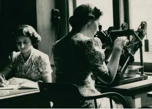  ??  ?? Mary Allen and Ethel Wilcocks measuring astrograph­ic plates at Sydney Observator­y in 1941. The “computers” worked in pairs, one reading measuremen­ts off the micrometer and the other recording them in a logbook.