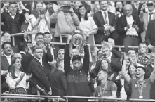  ?? AP ?? Klopp lifts the FA Cup after Liverpool’s victory over Chelsea at Wembley Stadium in London in 2022.