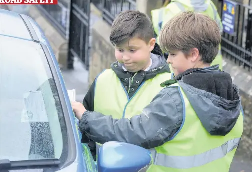  ??  ?? Campaign Pupils at West Coats have taken it upon themselves to get the message across to drivers by giving out leaflets