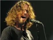  ?? PHOTO BY CHRIS PIZZELLO — INVISION — AP, FILE ?? Chris Cornell, 52, who gained fame as the lead singer of the bands Soundgarde­n and Audioslave, died Wednesday in a hotel room in Detroit.