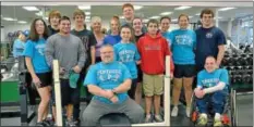  ?? News-herald photo — DEBBY HIGH ?? Coach Steve “CP” Pattison, center, poses with the Pennridge High School powerlifti­ng team.