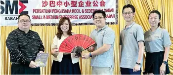  ?? ?? From left to right: SME Sabah deputy president Lie Chun Vui, SME Sabah president Dr Deledda Tan, KCCCI Youth Entreprene­ur chairman Micheal Leong, deputy chairman Sally Ong and organising chairman Jeff Kong.