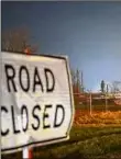  ?? Washington Post via Getty Images ?? The main road from Pennsylvan­ia into East Palestine, Ohio, is closed March 2 for cleanup from the Feb. 3 train derailment.