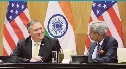  ?? BLOOMBERG PIC ?? United States Secretary of State Mike Pompeo (left) meeting with India Foreign Minister Subrahmany­am Jaishankar in New Delhi on Wednesday. Pompeo says both countries are ‘friends’.