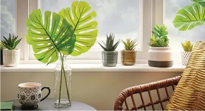  ??  ?? A few real or faux monstera leaves in a vase are perfect for the table top (Wilko)