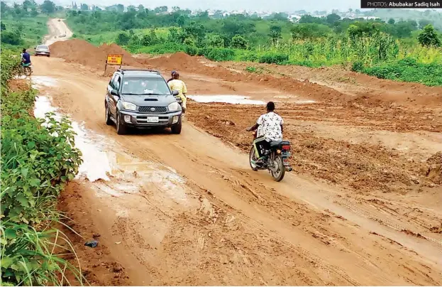  ?? Abubakar Sadiq Isah ?? The 14 kilometer uncomplete­d Pegi-Kuje road PHOTOS: