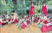  ?? PRAFUL GANGURDE/HT ?? At an event held in associatio­n with HT, students of Singhania School planted saplings in their school premises with students from a tribal school in Yeoor, on Saturday.